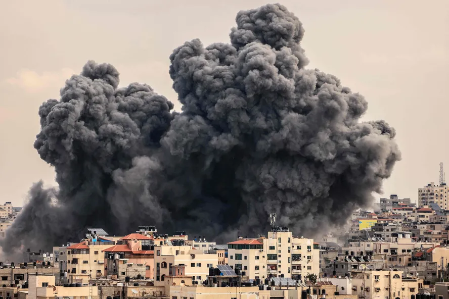 104617967-a-plume-of-smoke-rises-in-the-sky-of-gaza-city-during-an-israeli-airstrike-on-october.jpg.webp